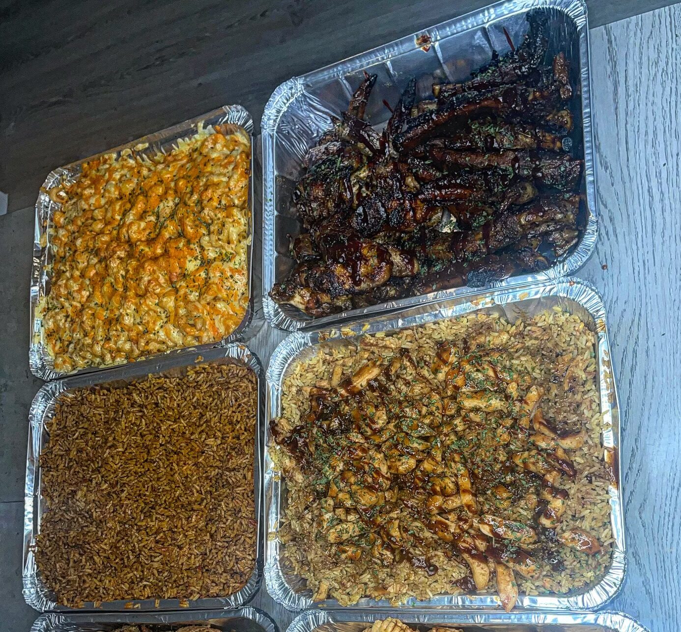 Mac N Cheese, BBQ Pork Ribs, Jollof Rice, Penne Pasta Alfredo